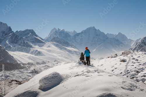 Trekker in Khumbu valley on a way to Everest Base camp © Maygutyak