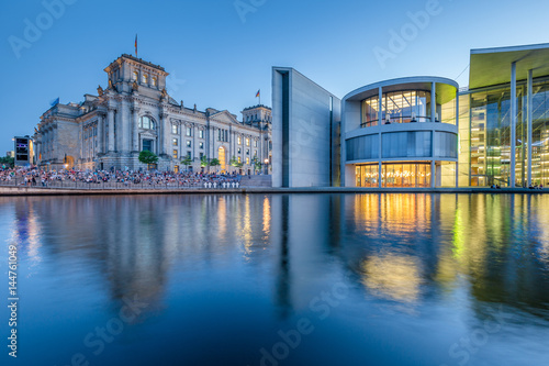 Berlin government district with Reichstag and Spree river in twilight, central Berlin Mitte, Germany