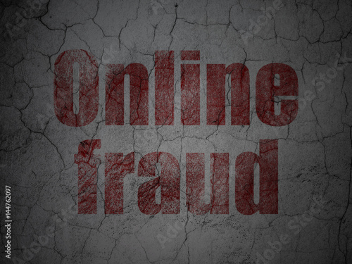 Protection concept: Online Fraud on grunge wall background