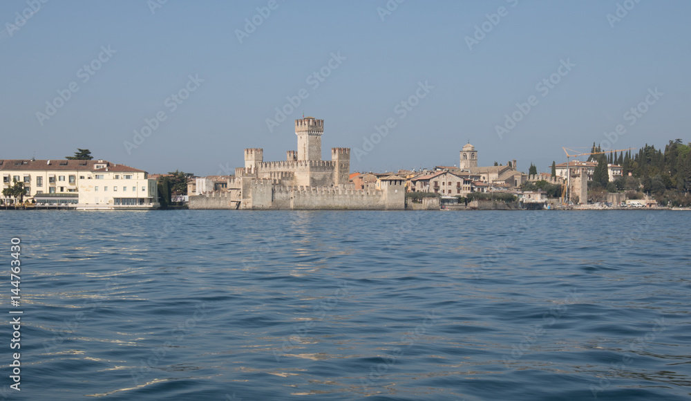 Fortfress of Sirmione from the Garda lake in Italy