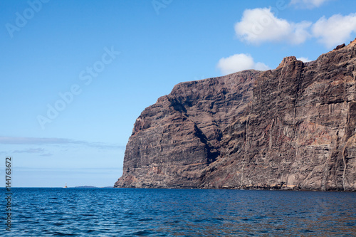 View from the Atlantic ocean at the giant rough cliffs  Acantilados de Los Gigantes. Tenerife island  Canary  Spain  Europe