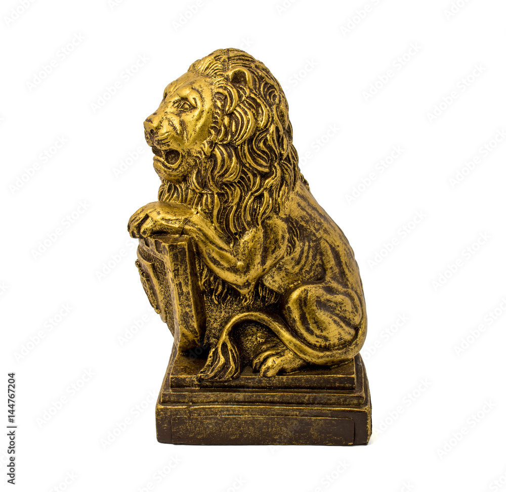 Gold statuette of a lion with shield isolated on a white background Gold statuette of a lion with shield isolated on a white background