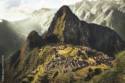 MACHU PICCHU, PERU - MAY 31, 2015: View of the ancient Inca City of Machu Picchu. The 15-th century Inca site.'Lost city of the Incas'. Ruins of the Machu Picchu sanctuary. UNESCO World Heritage site.