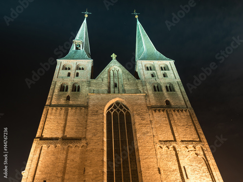 Deventer at night with the twintower Bergchurch photo