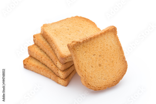 Slices of toast bread on wooden table, top view.