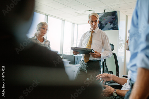 Business professionals having a brainstorming session in office