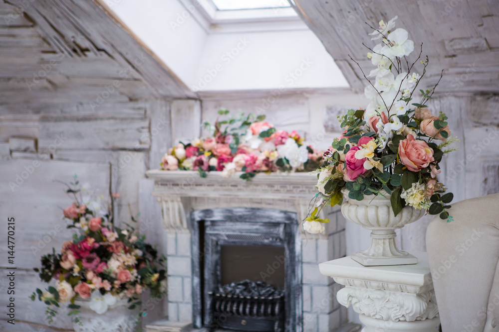 Fireplace and decor of flowers