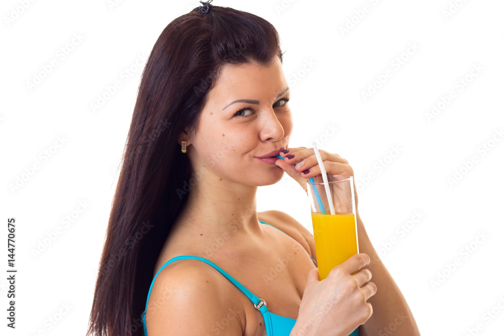 Woman in swimming suit holding cocktail Woman in swimming suit holding cocktail