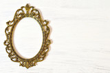 Empty vintage picture frame on white grunge background
