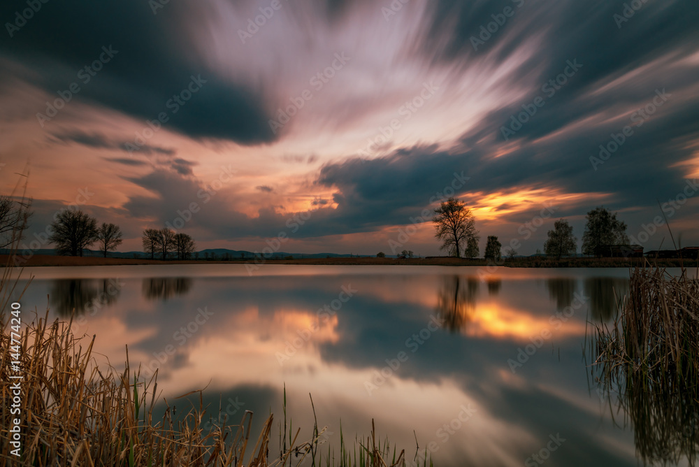 Magnificent long exposure lake sunset