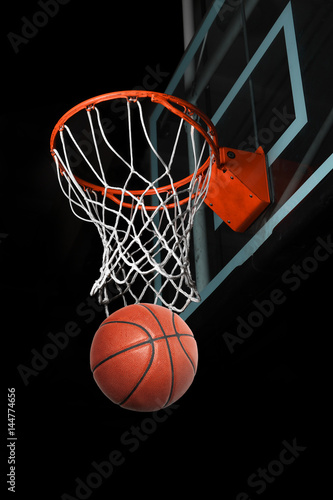 Basketball Going Through Hoop