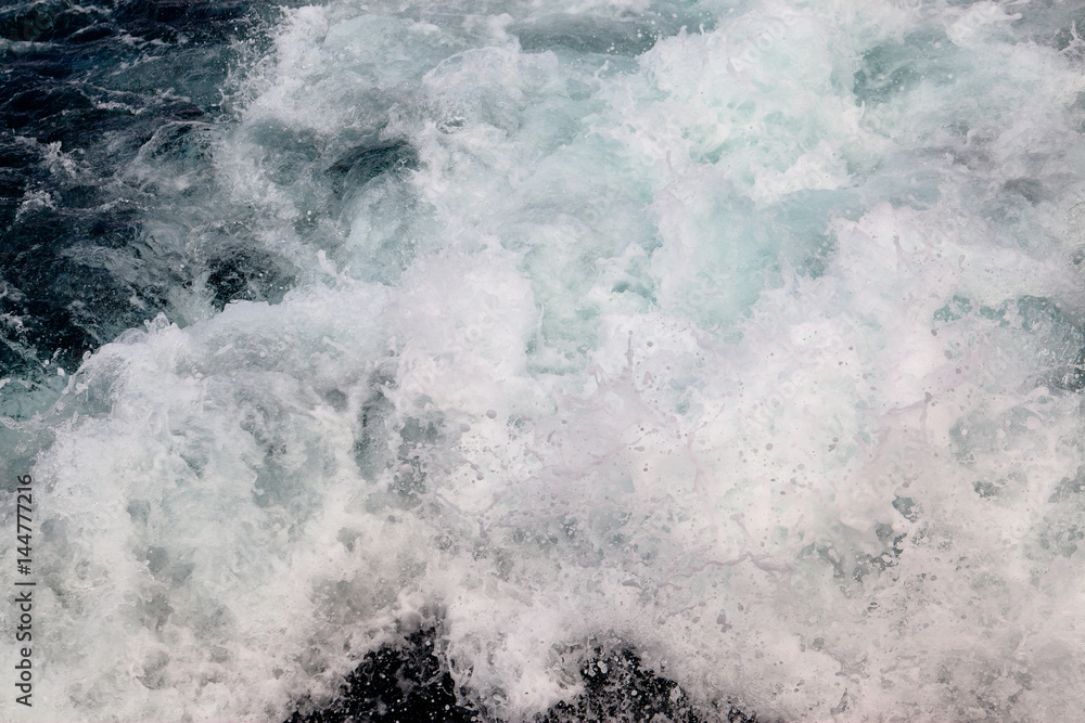 Trail on water surface behind of cruise ship Trail on water surface behind of cruise ship