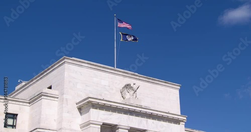 Federal Reserve Building Washington DC Zoom Out from Flags