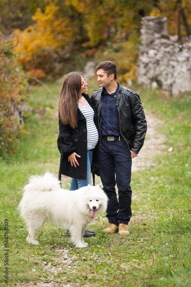 Caucasian couple in autumn expecting Caucasian couple in autumn expecting