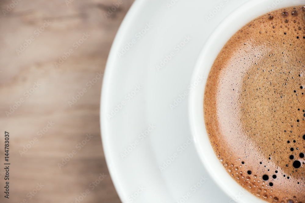 Coffee cup on rustic wooden table. Coffee cup on rustic wooden table.