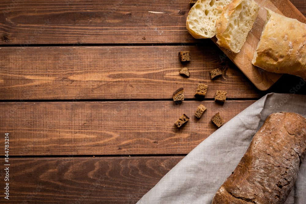 Baking bread ingredients on wooden table background top view mockup