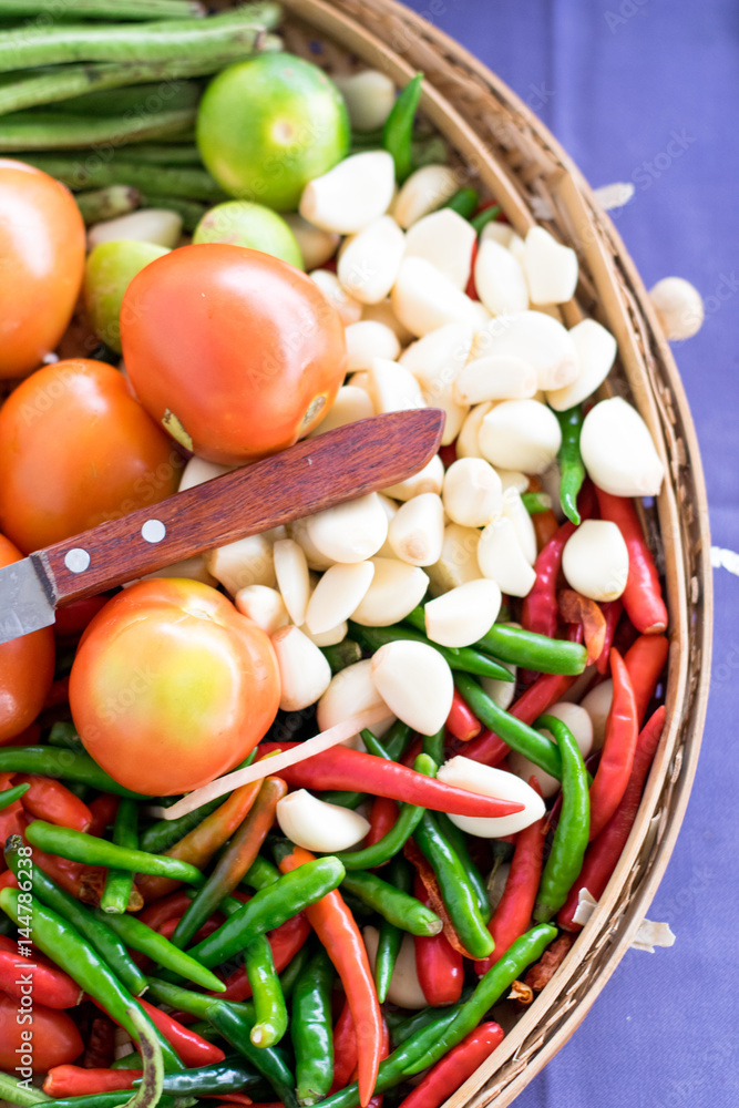 mixed vegetables in basket and knife mixed vegetables in basket and knife