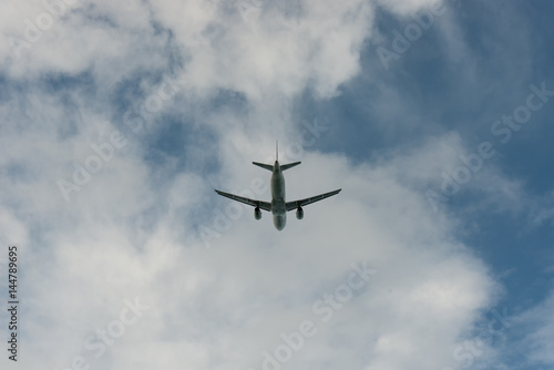 Below view Airplane in the sky and cloud