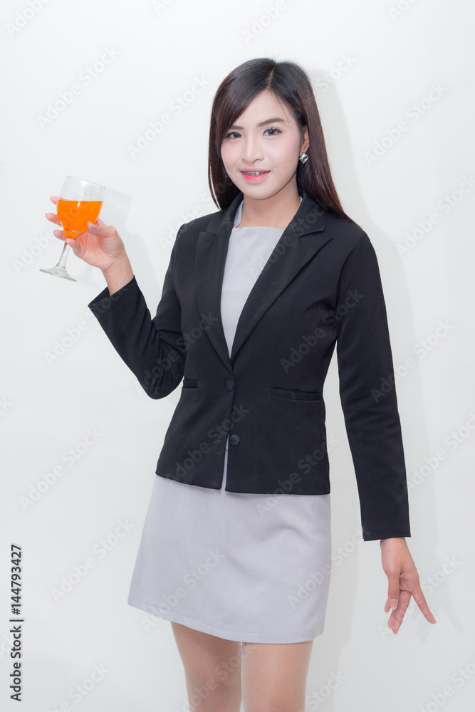 Woman holding orange juice Woman holding orange juice