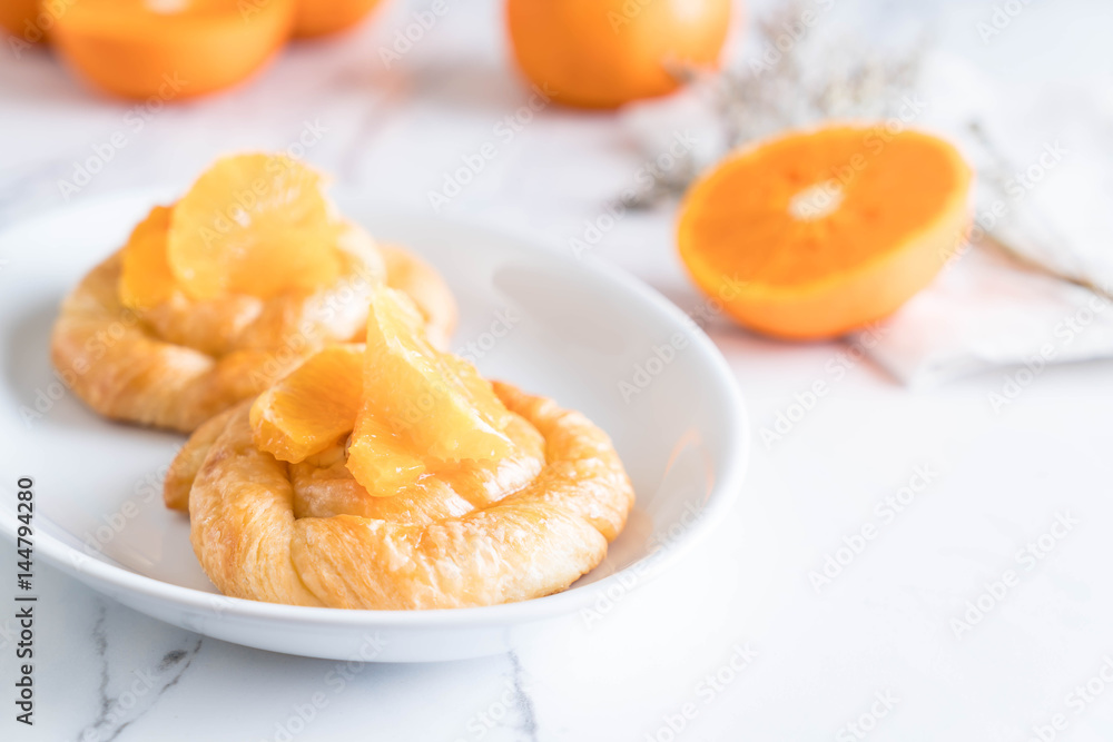 orange tart on plate orange tart on plate