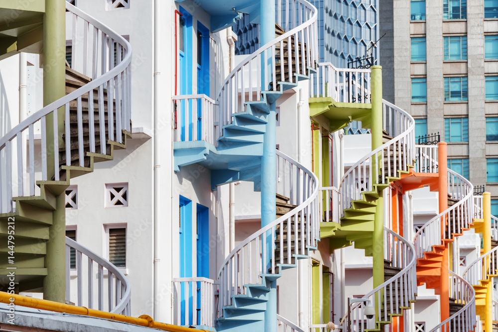 Fototapeta premium Amazing colorful exterior spiral staircases in Singapore