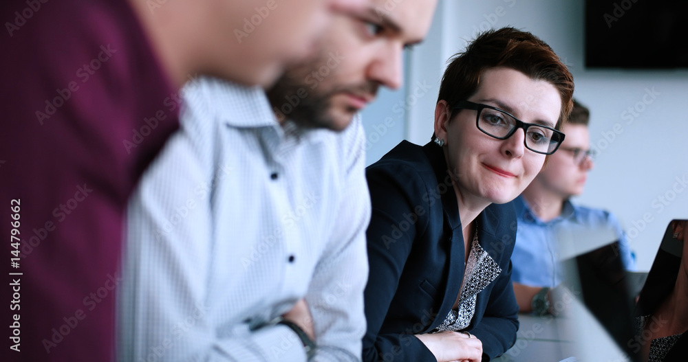 Business Team At A Meeting at modern office building Business Team At A Meeting at modern office building