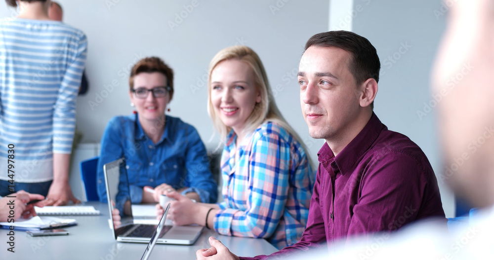 Business Team At A Meeting at modern office building Business Team At A Meeting at modern office building