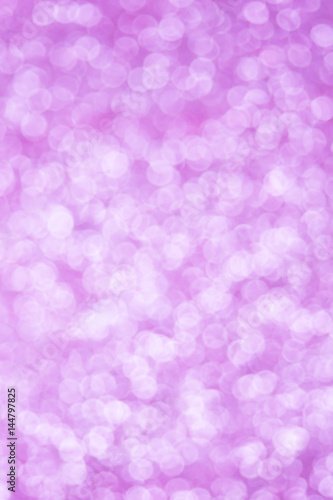 pink bokeh texture. Festive glitter background with defocused lights