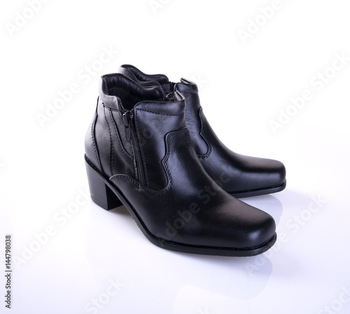 shoe or black color lady shoes on a background.