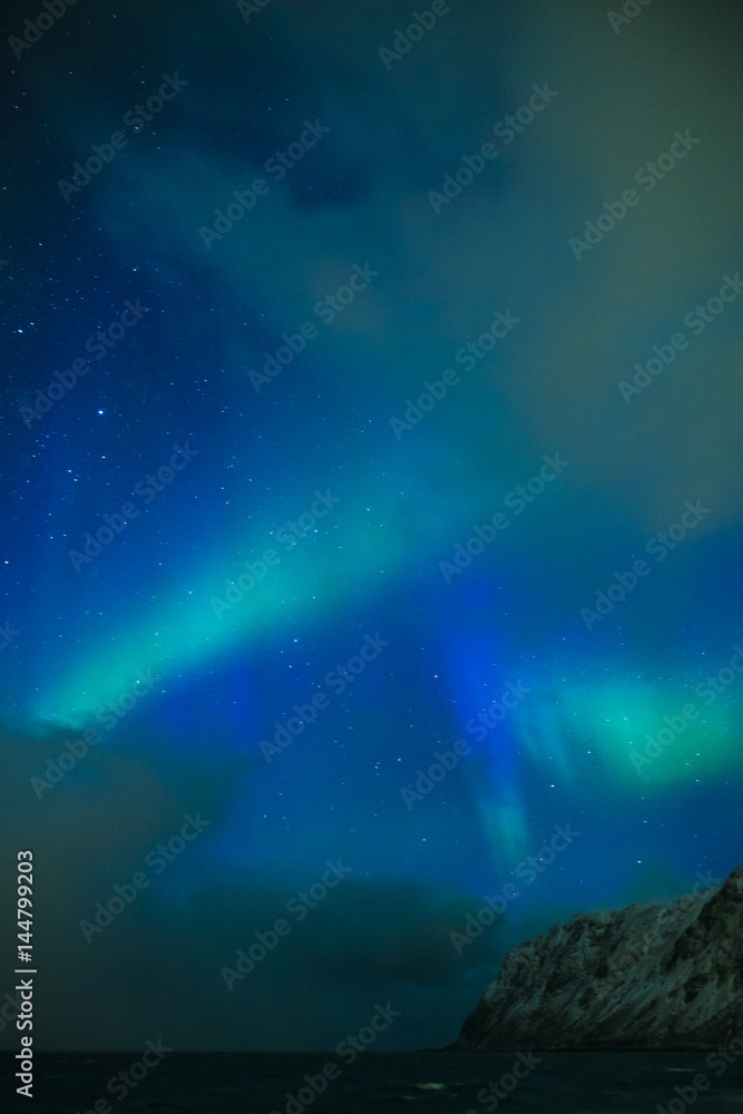 Amazing and Unique Nothern Lights Aurora Borealis Over Lofoten Islands in Norway, Over the Polar Circle.