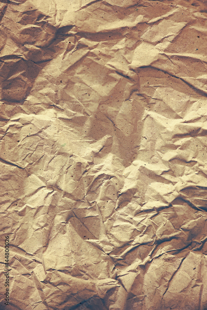 Old brown crumpled paper background