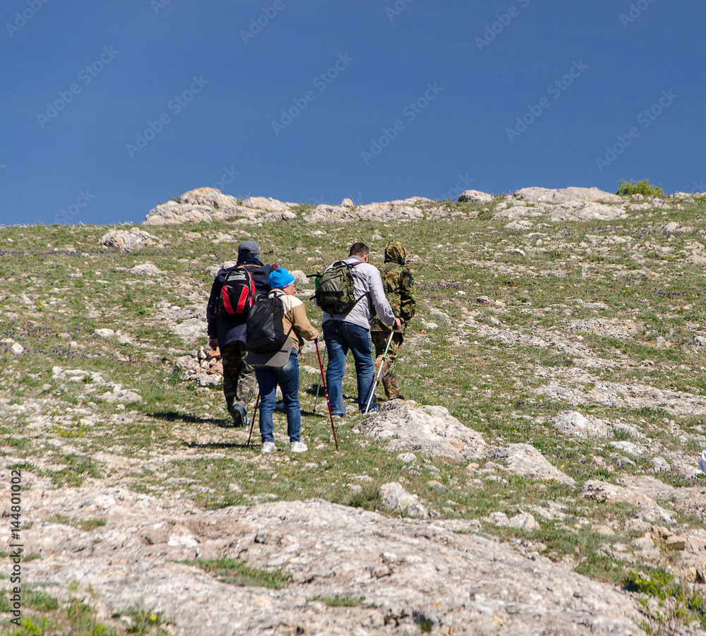 Fototapeta premium tourists in mountain