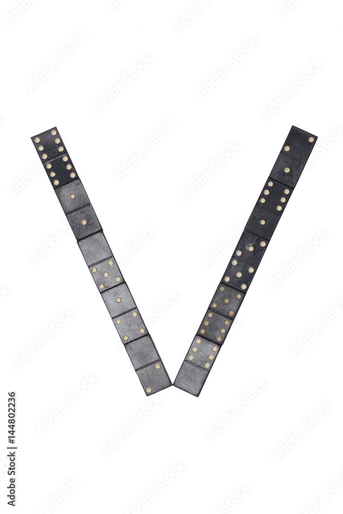 letter V made of  black  dominoes tiles
