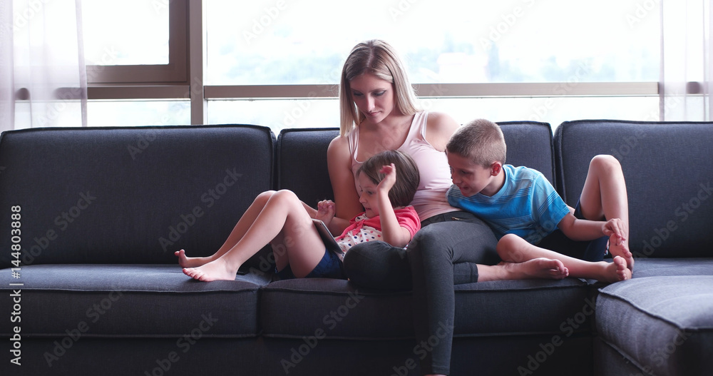 Happy Young Family Playing Together at home Happy Young Family Playing Together at home