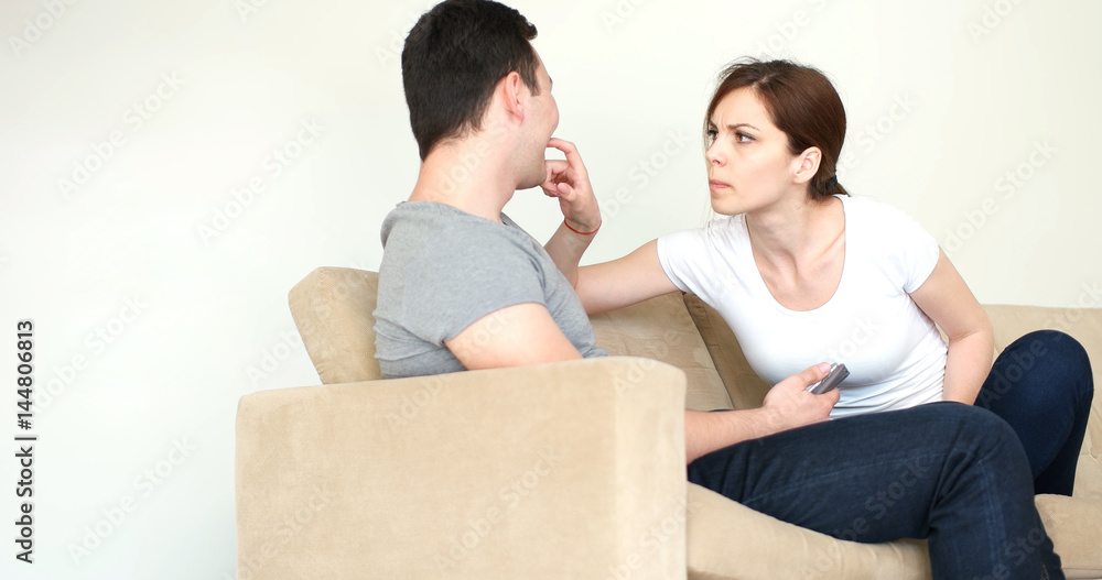 Young Couple using digital tablet at home Young Couple using digital tablet at home