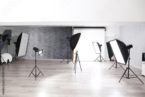 Empty photo studio with lig...