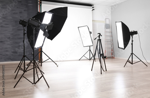 Empty photo studio with lig...