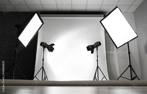 Empty photo studio with lig...
