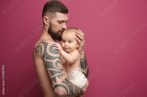 Handsome tattooed young man...
