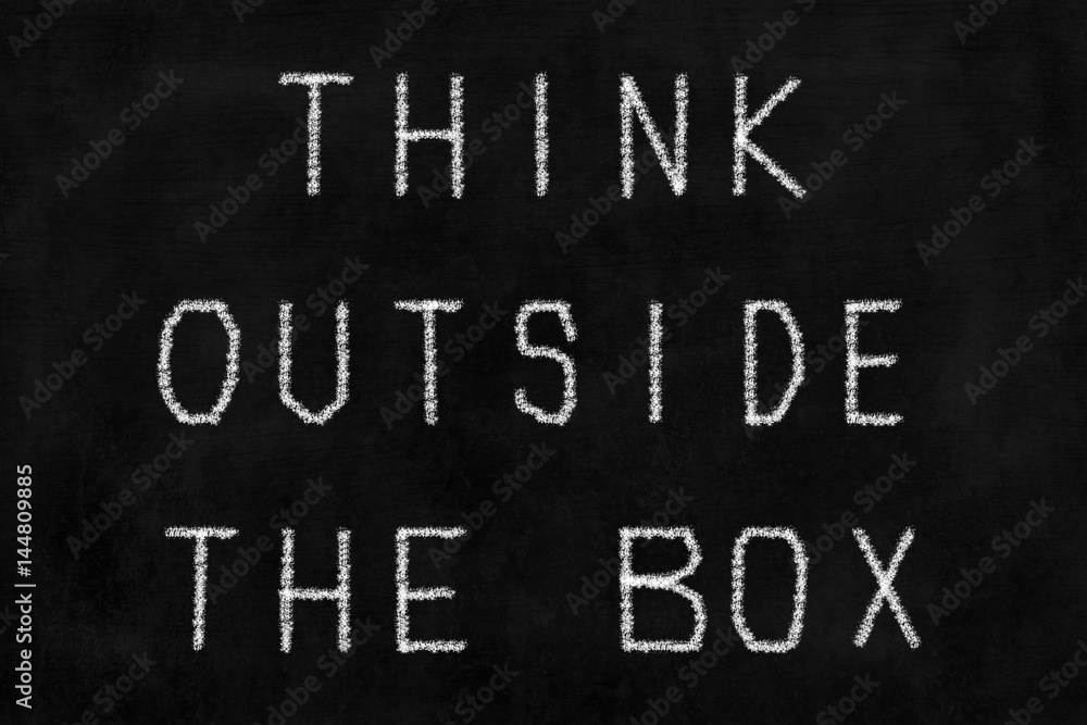 Chalkboard with Think Outside The Box Handwriting. Chalkboard with Think Outside The Box Handwriting.