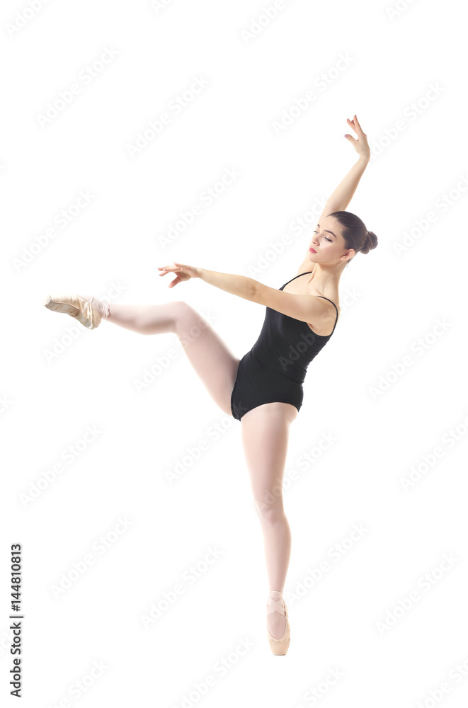 Fototapeta premium Young beautiful ballerina dancing on white background