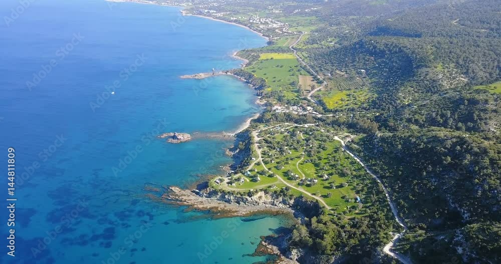 flying over the island. Landscape. Mediterranean Sea and the coast. Cyprus. City resort. Drone Point of View. Blue lagoon with rocks and stones. paradise. flying over the island. Landscape. Mediterranean Sea and the coast. Cyprus. City resort. Drone Point of View. Blue lagoon with rocks and stones. paradise.