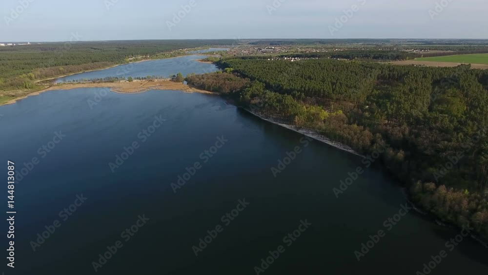 Beautiful forest near the lake. Aerial view Beautiful forest near the lake. Aerial view