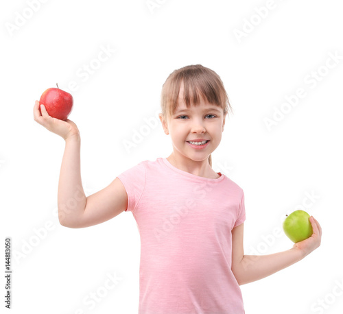 Happy schoolgirl with apple...