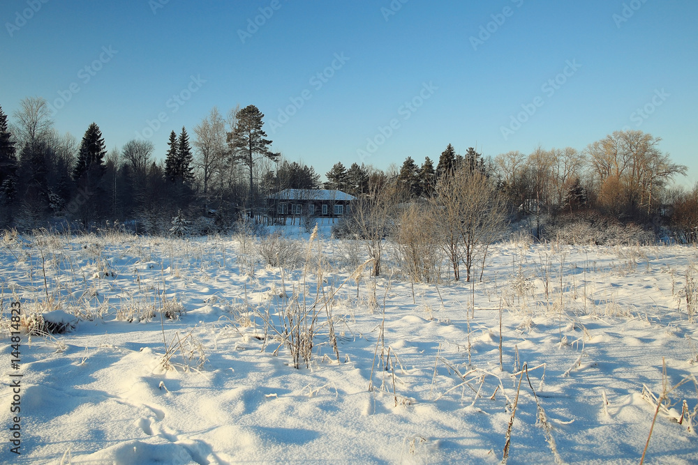winter landscape with a horizon, field and sky
