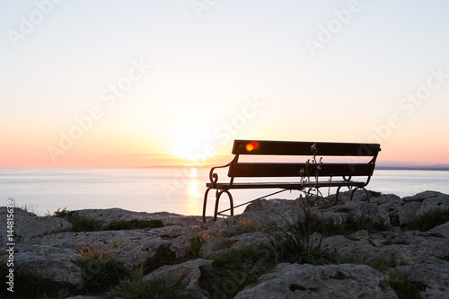 Sunset beach and bench