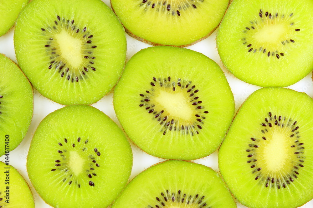 slices of fresh green kiwi fruits food background texture slices of fresh green kiwi fruits food background texture