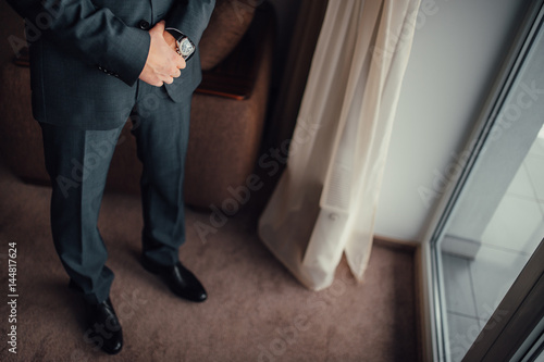 Male feet close-up. Feet grooms at a wedding in Montenegro.