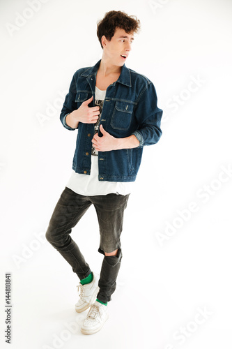 Full length portrait of man posing in studio