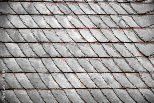 Genuine black slate shingle tiles on a roof in Winterberg in Germany